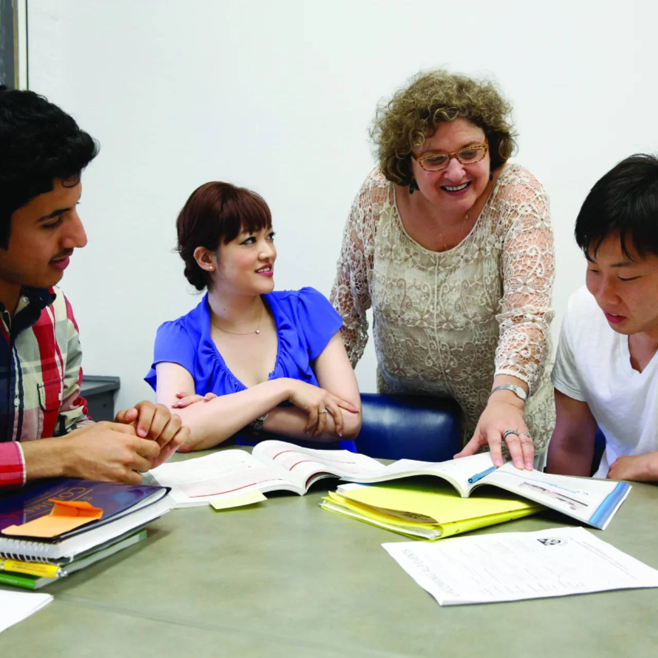 ALP teacher interacts with students in class